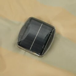 11' X 11' Calypso II Market Patio Umbrella With Solar LED Strip Lights Champagne/Taupe - Island Umbrella -Garden Furniture Discounts GUEST 3ca9f2c6 20d6 4c65 afb4 c9e4bcc684a6